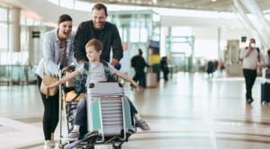 Smiling family at the airport